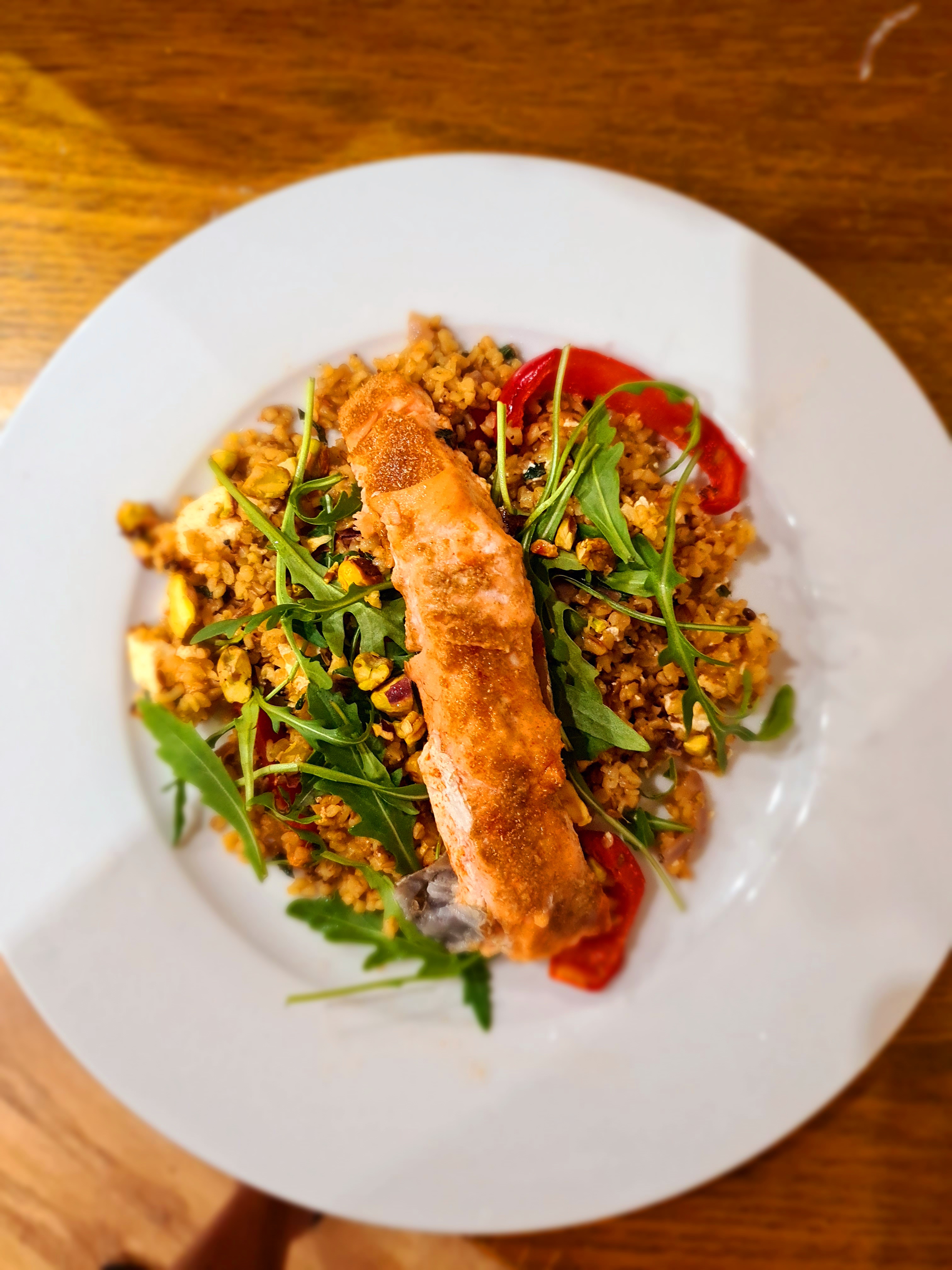 Sticky Pistachio Crusted Salmon with Herby Feta Bulgar Wheat, Roasted Red Pepper and Rocket