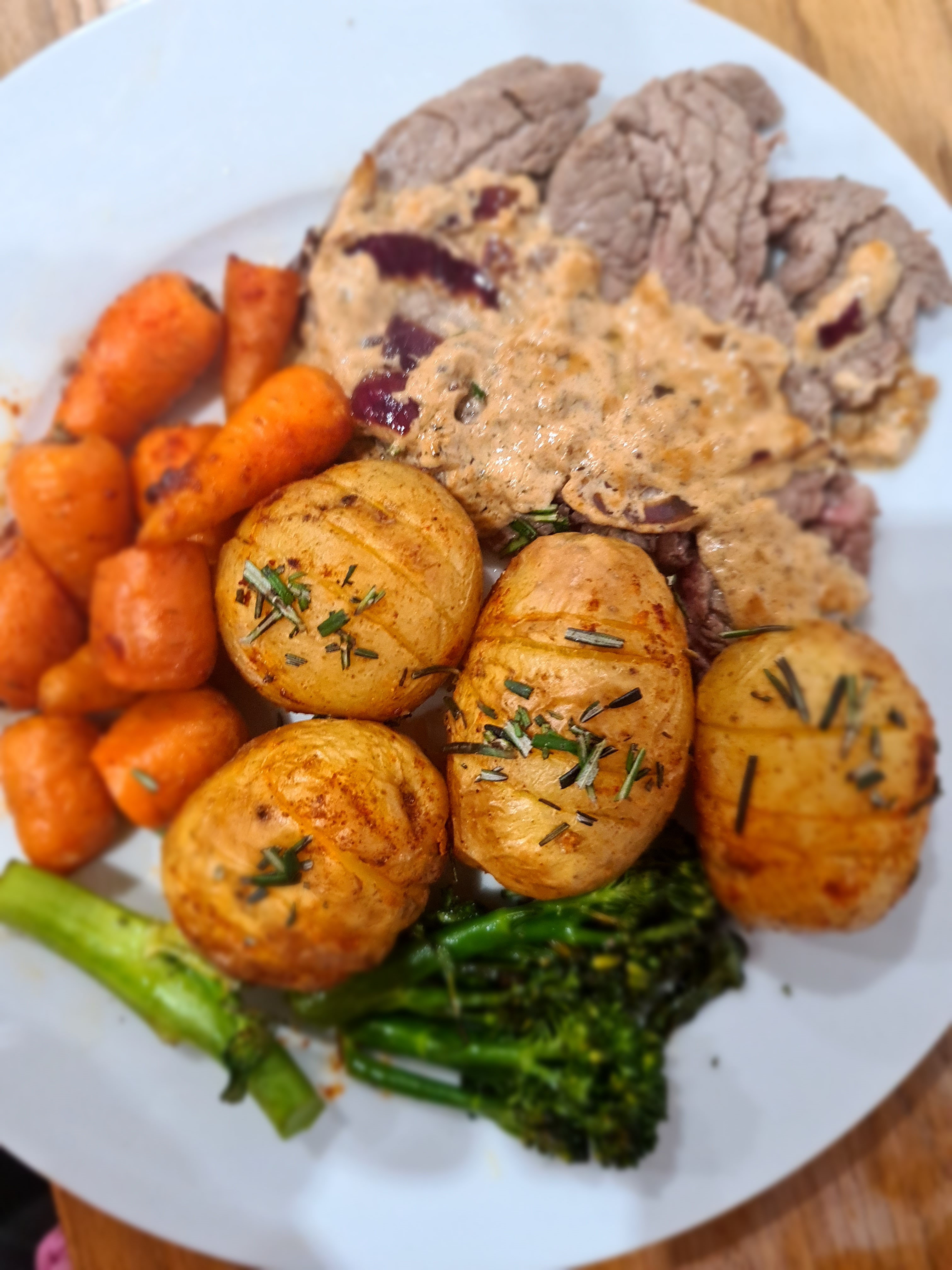 Fillet Steak and Creamy Peppercorn Sauce with Rosemary Hasselbacks, Chantenay Carrots & Tenderstem