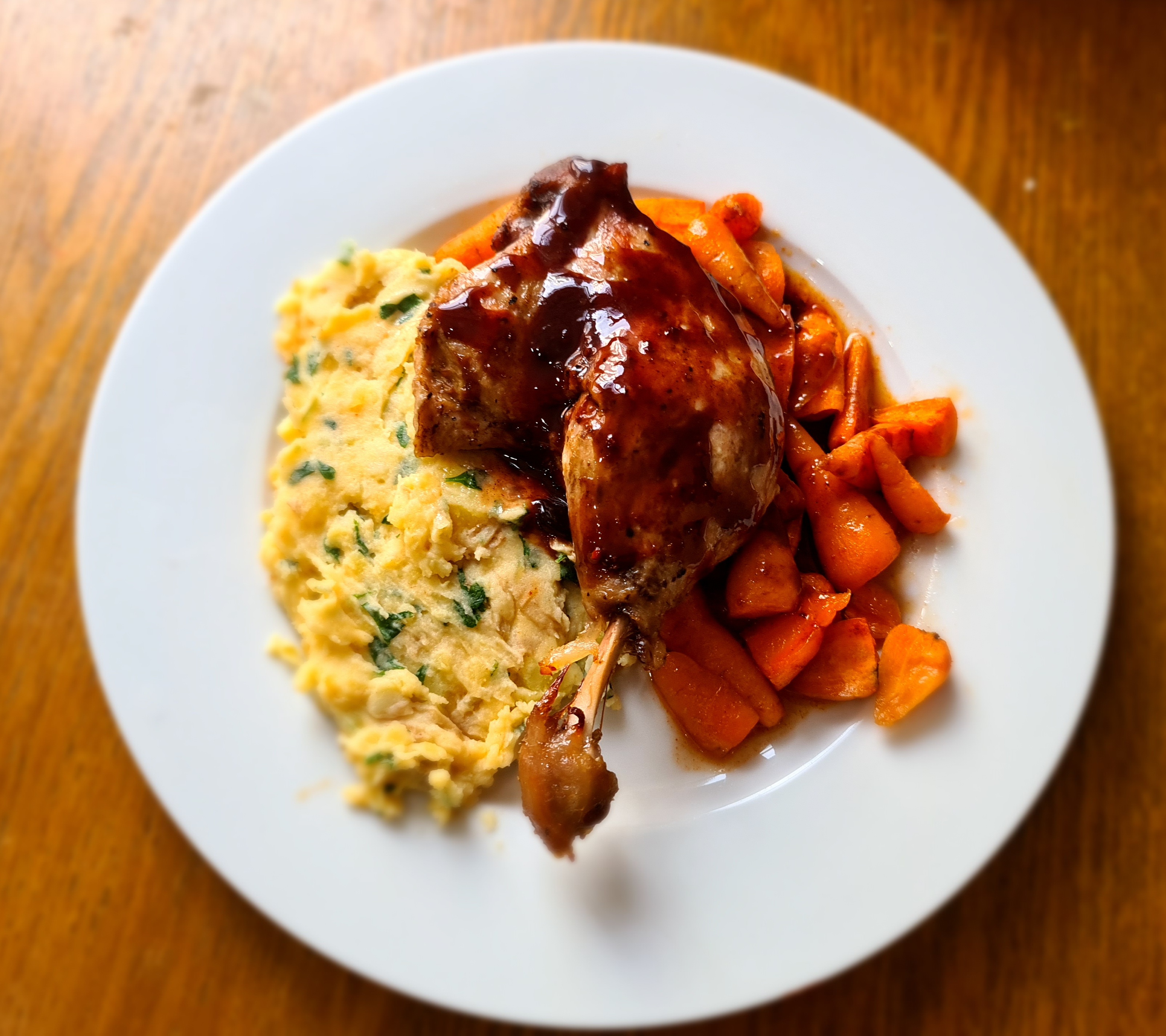 Curvy duck and Red currant jus with roasted Garlic mash and Chantenay Carrot